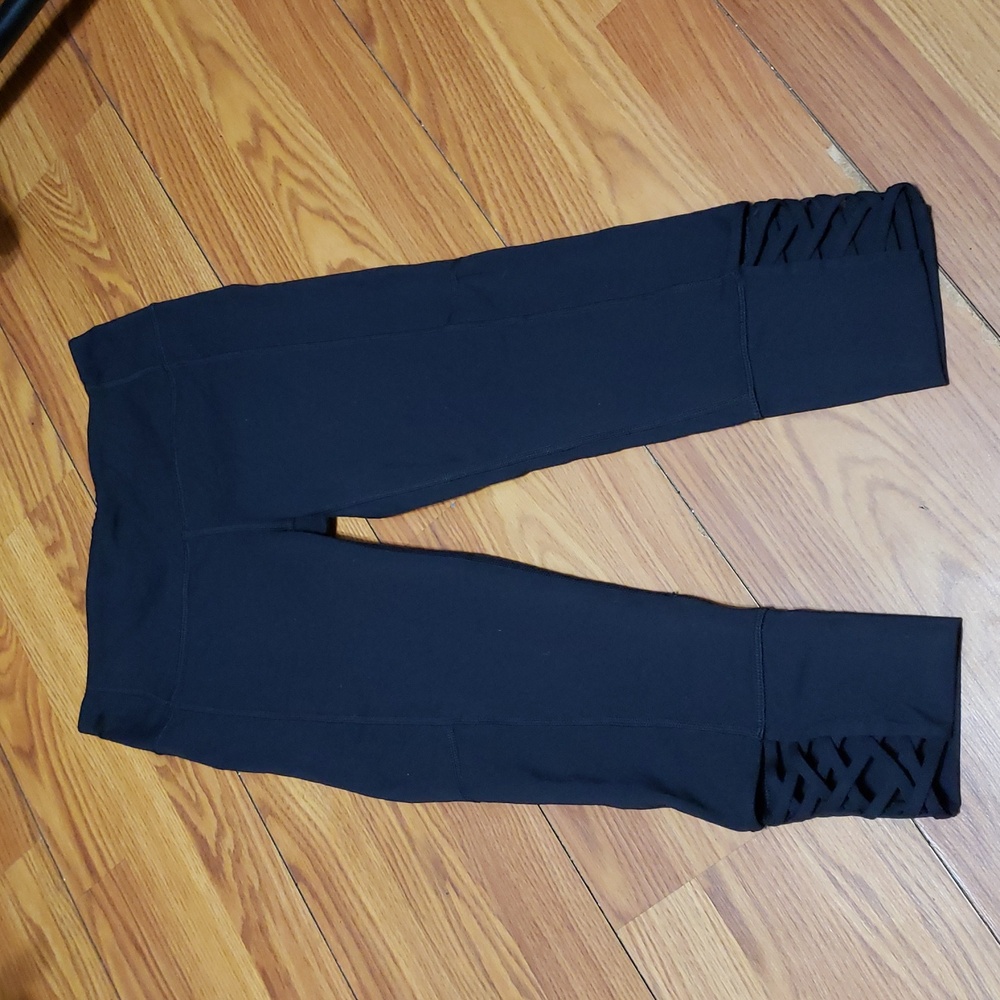 Athleta Mind Over Mat Blackβ Capri Leggings with Lattice Detail